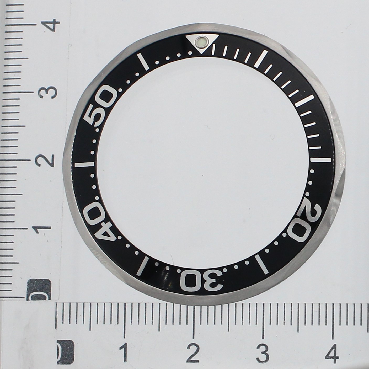 Factory original Omega bezel in very good condition thumbnail 1